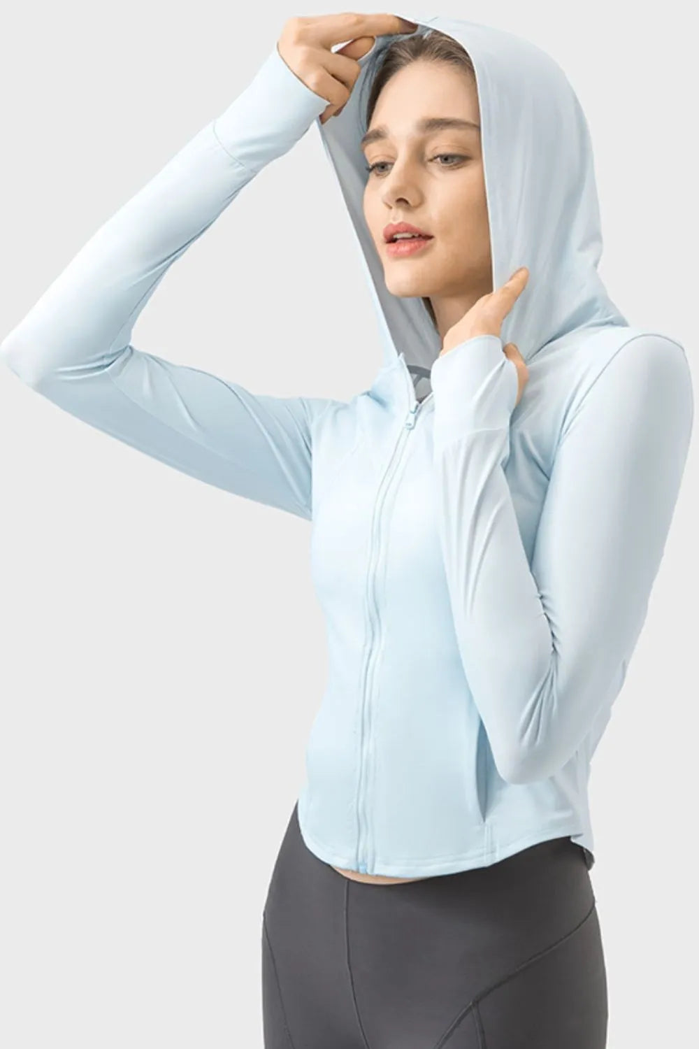 Millennia Pocketed Zip Up Hooded Long Sleeve Active Outerwear Carauana Store