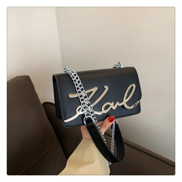 CaRaUaNa Karl Clutch Bag Black