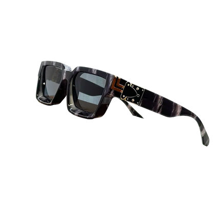 Carauana Millionaire GO with decorative arm on a cardboard box