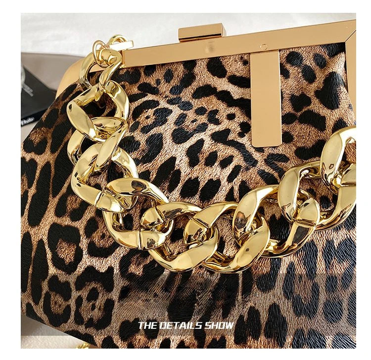 Leopard print clutch with gold chain detail