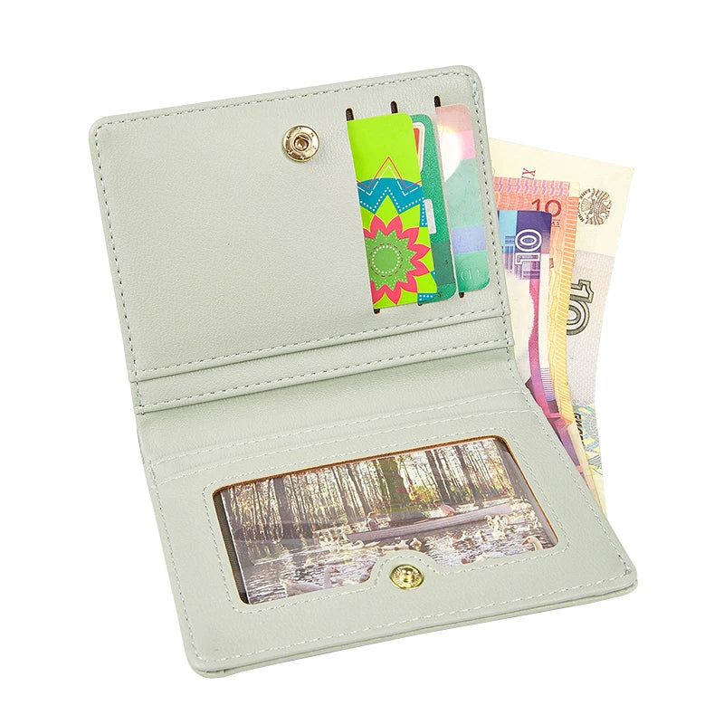Light gray wallet with cards and money