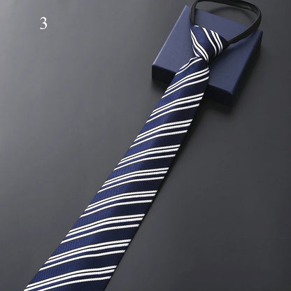 Navy and white striped tie on a dark gray background