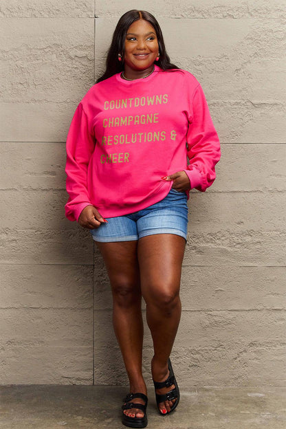 Simply Love Full Size COUNTDOWNS CHAMPAGNE RESOLUTIONS & CHEER Round Neck Sweatshirt Carauana Store