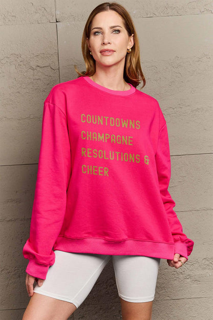 Simply Love Full Size COUNTDOWNS CHAMPAGNE RESOLUTIONS & CHEER Round Neck Sweatshirt Carauana Store