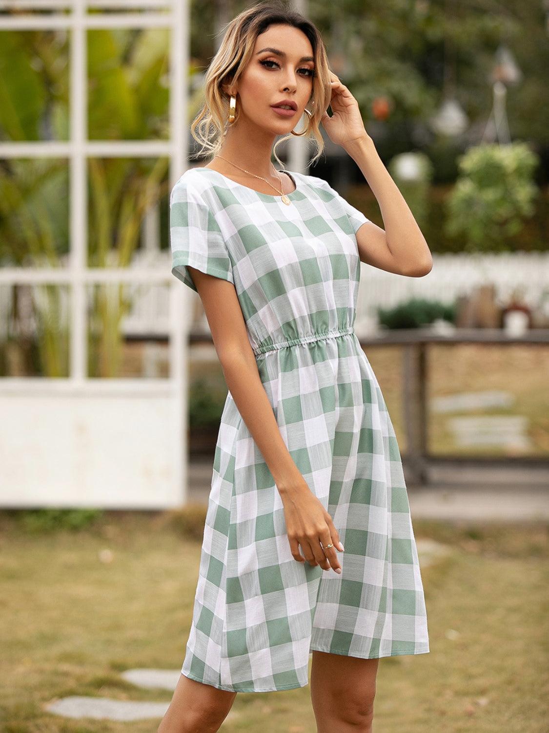 Smocked Plaid Round Neck Short Sleeve Dress Carauana Store