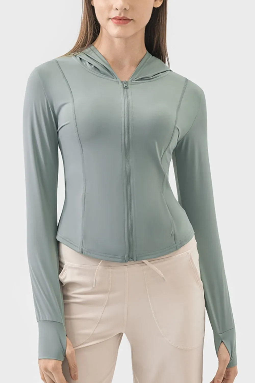 Millennia Pocketed Zip Up Hooded Long Sleeve Active Outerwear Carauana Store